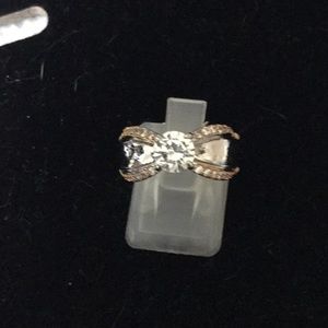 Sterling silver with rose gold and white sapphire